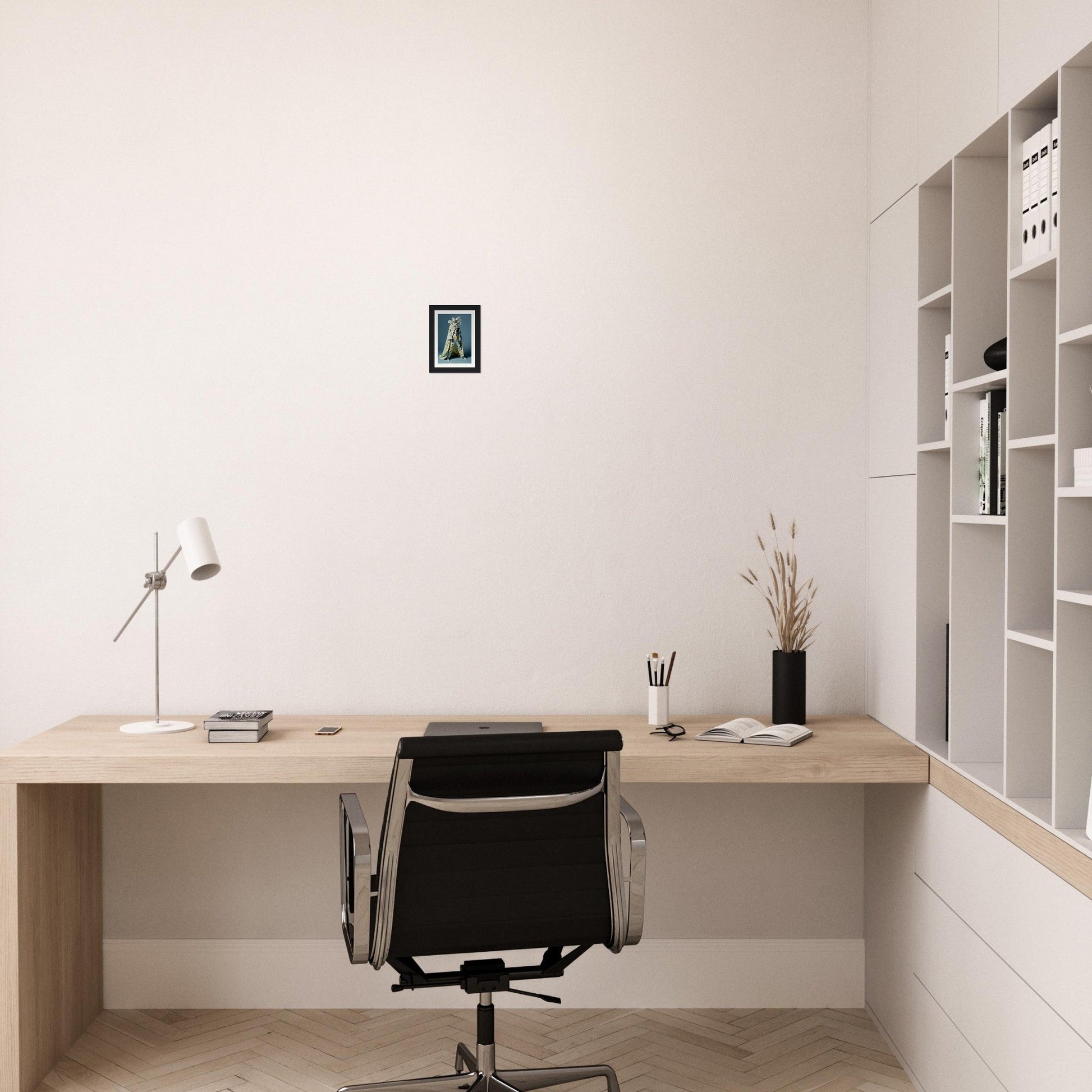 Minimalist wooden desk with a black office chair in a clean, white workspace.