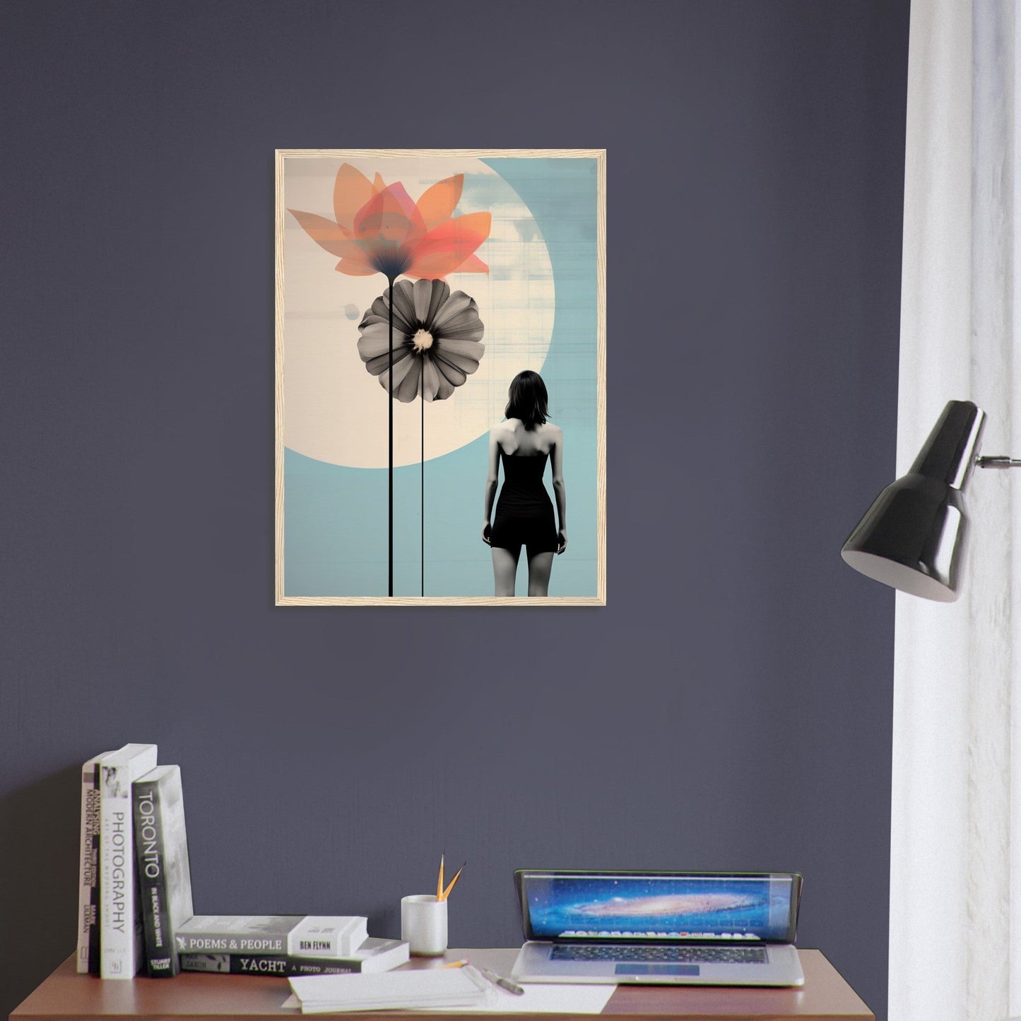 Framed artwork depicting stylized flowers and a silhouetted figure against a blue background with a white circle.