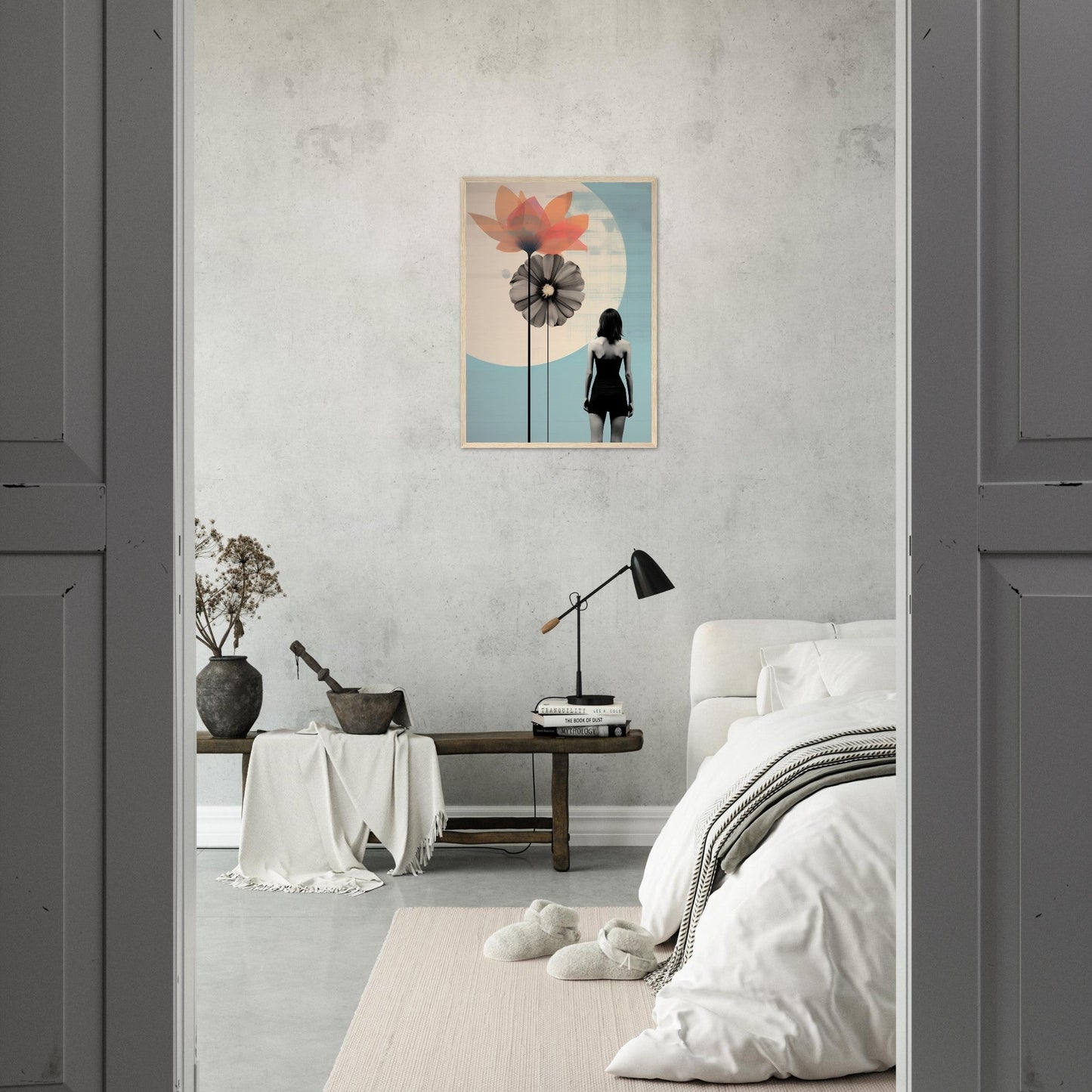 Minimalist bedroom with a striking artwork featuring a silhouette and floating spheres on the wall.