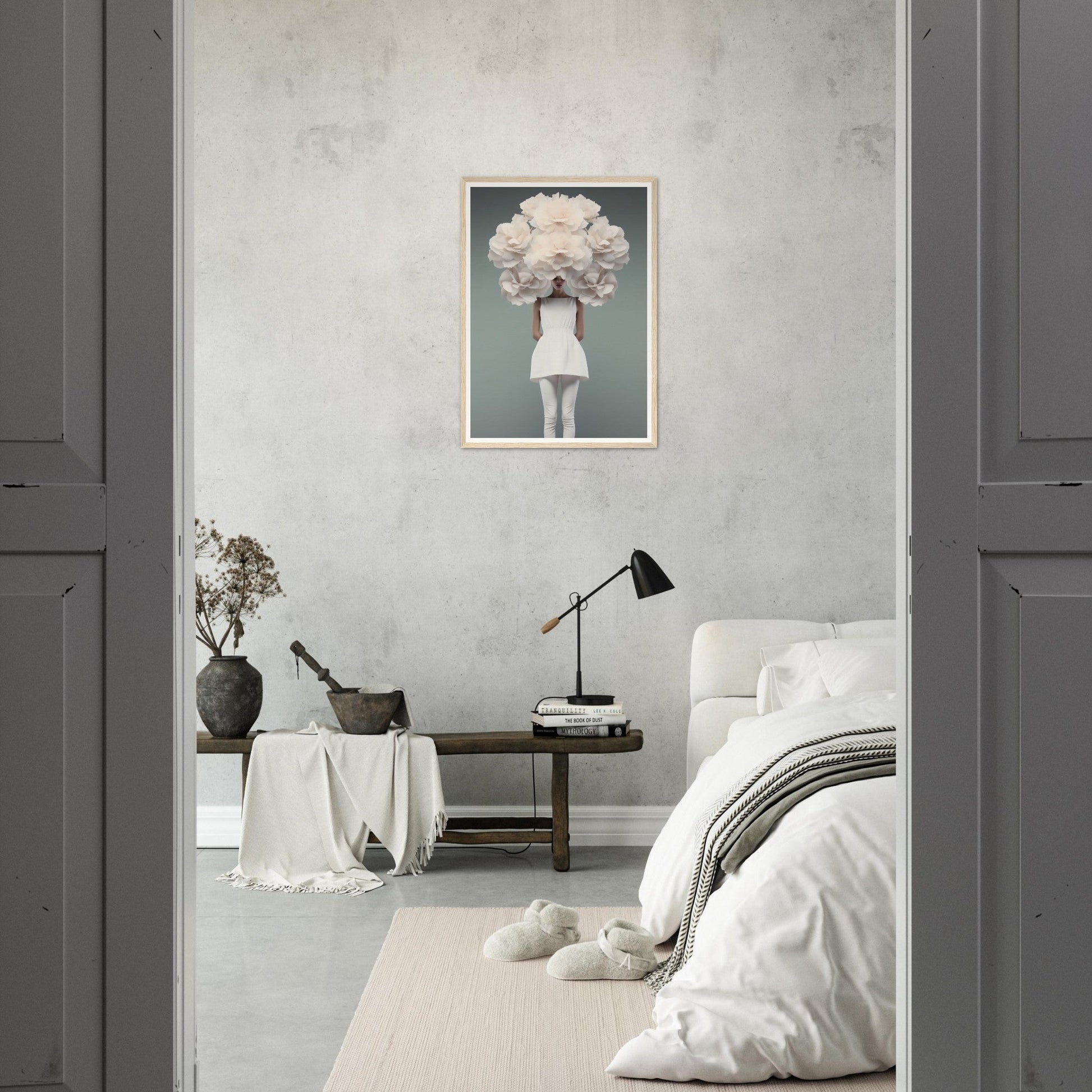 Minimalist bedroom with a striking surrealist artwork as the focal point.