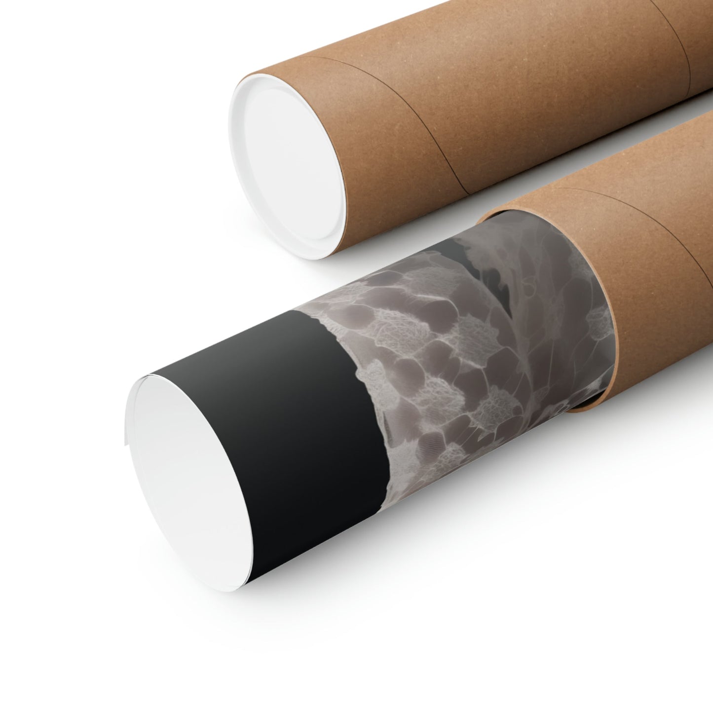 Two rolls of brown paper with black and white designs