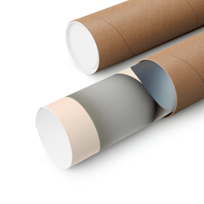 Two rolls of brown paper with white and grey paper