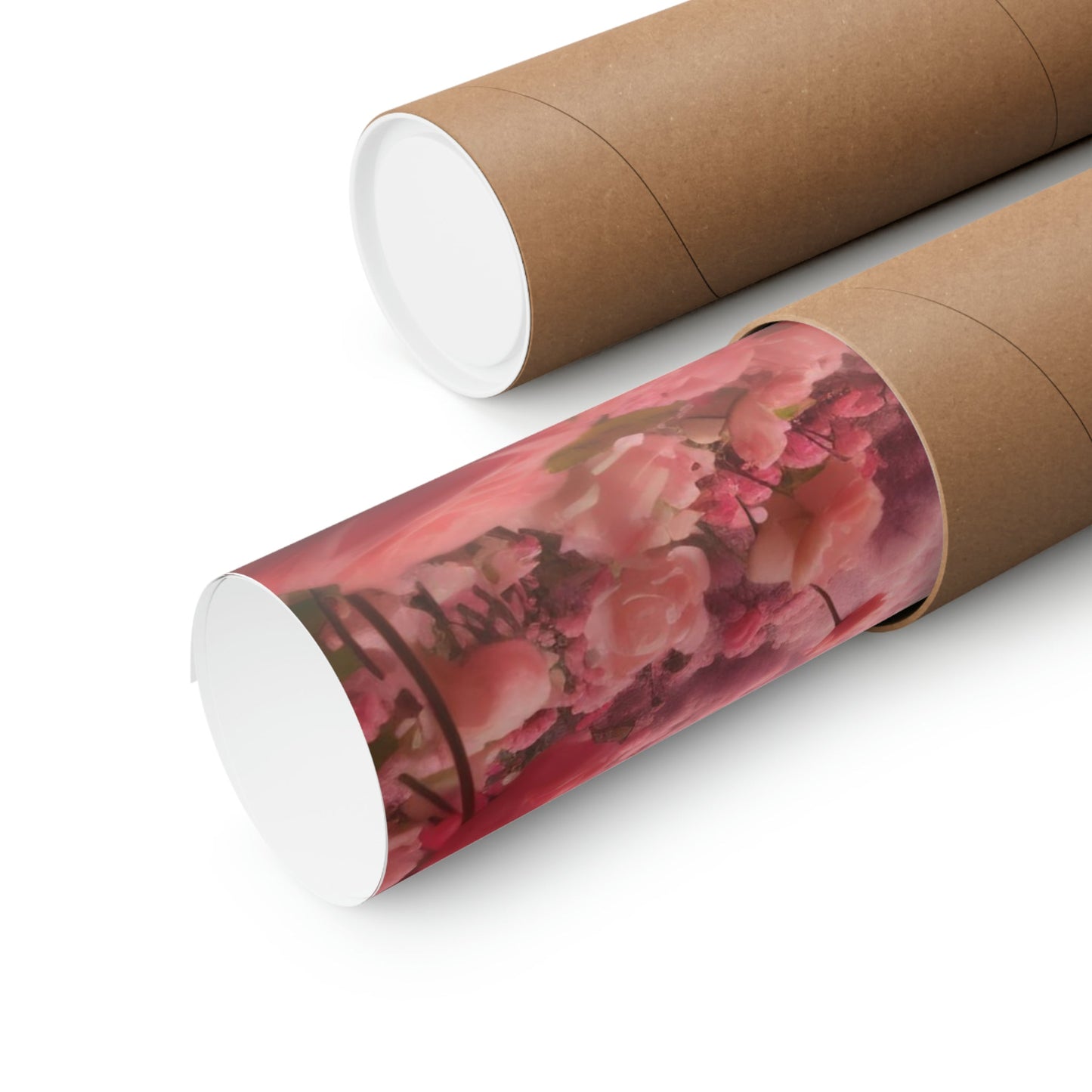 Two rolls of toilet paper with pink flowers on them