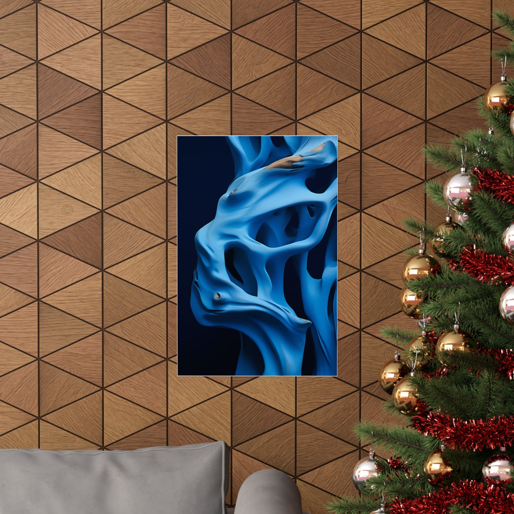 Abstract blue artwork depicting fluid, smoke-like shapes against a dark background.