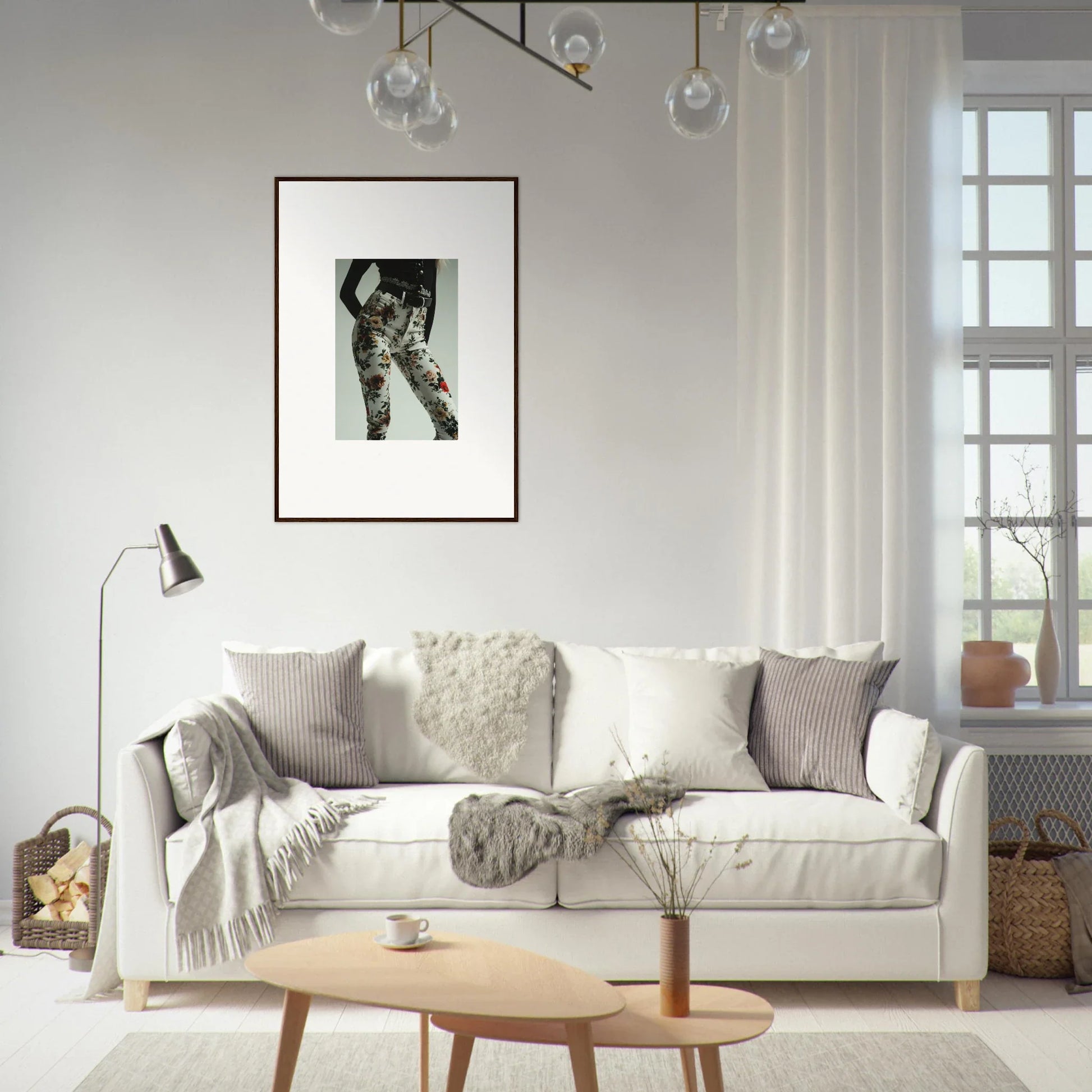 White sofa with throw pillows and blankets.