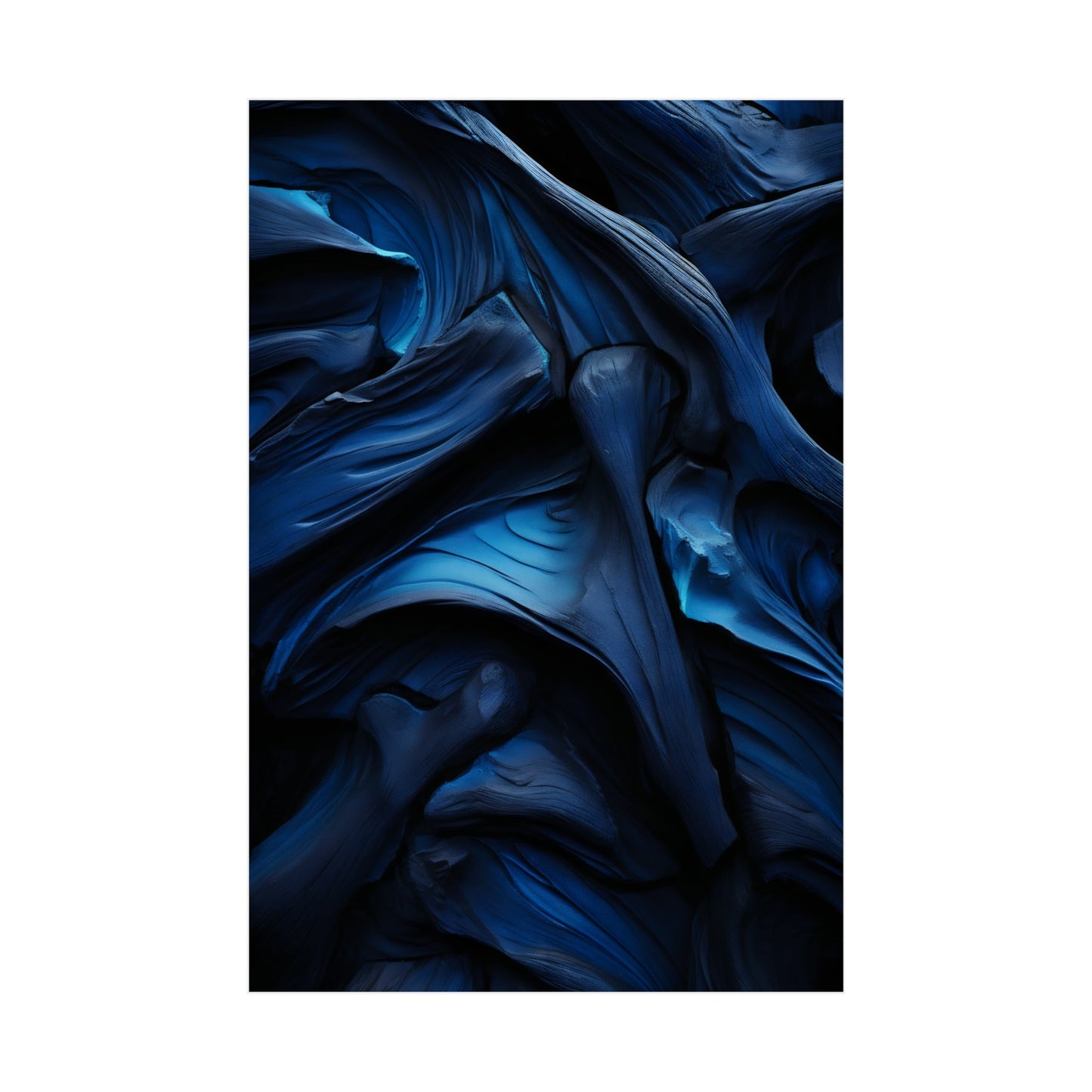 Abstract swirls and folds of deep blue fabric or material.