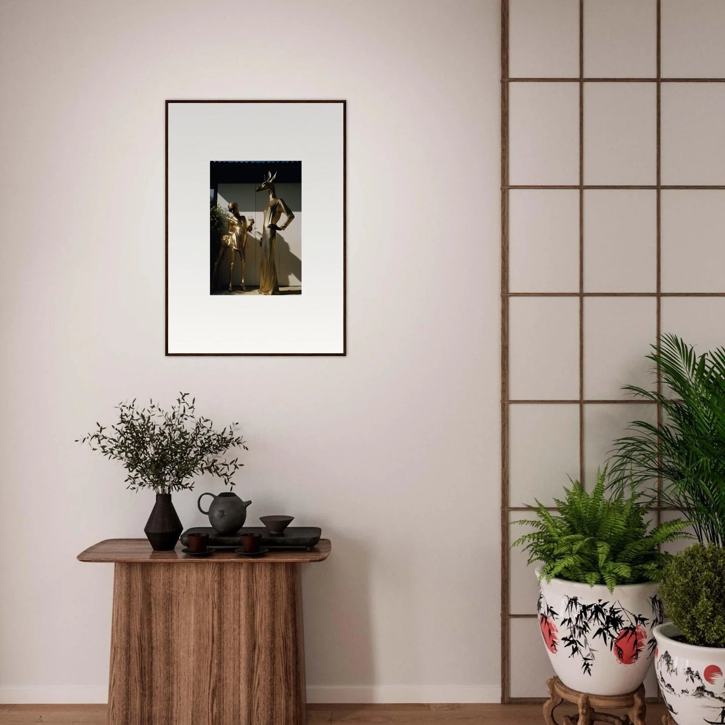 Framed photograph of a ballet or dance performance hanging on a wall.