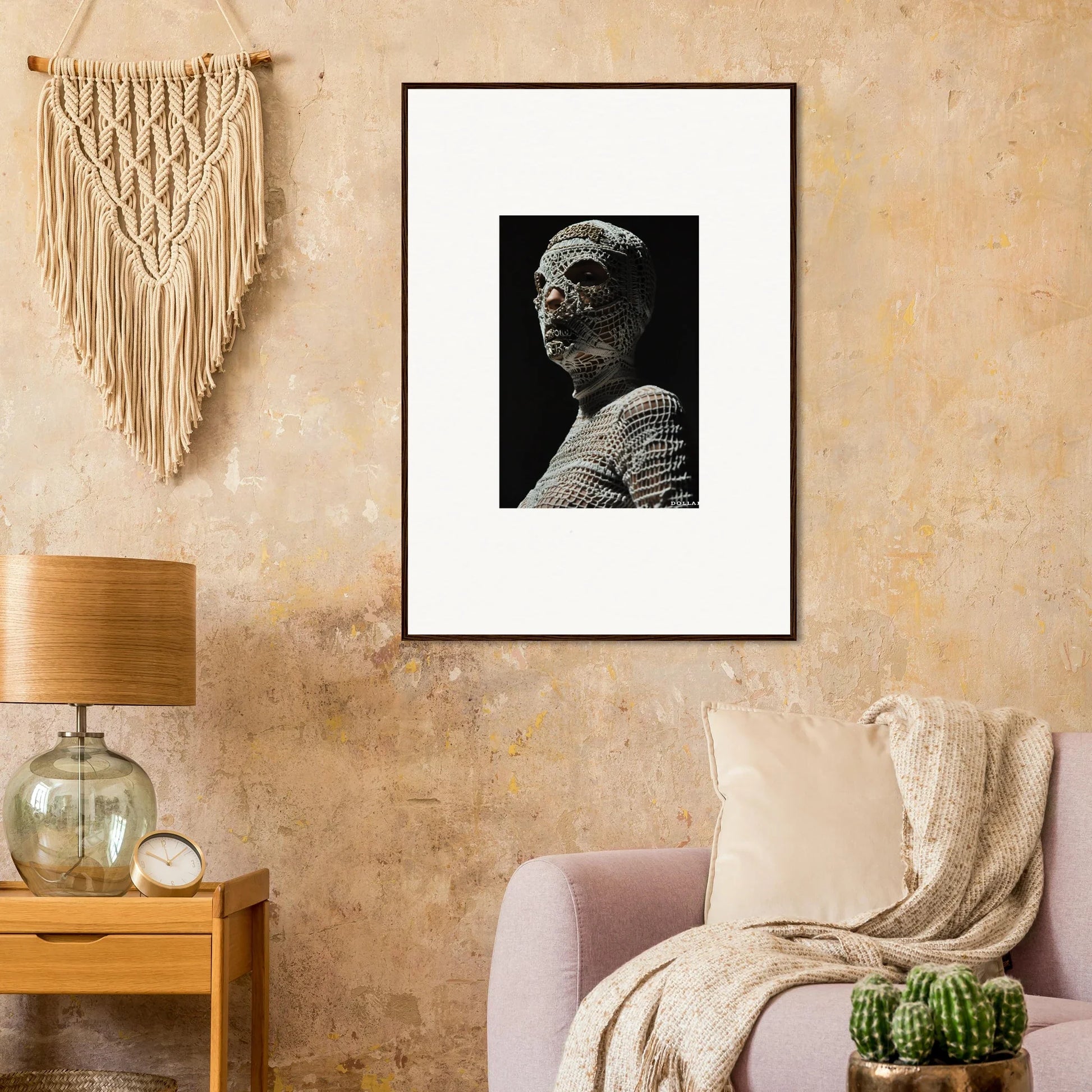 Framed black and white photograph of a sculpture or statue’s head and upper body.