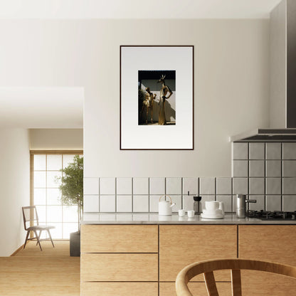 Modern kitchen with wooden cabinetry, tiled backsplash, and framed artwork on the wall.