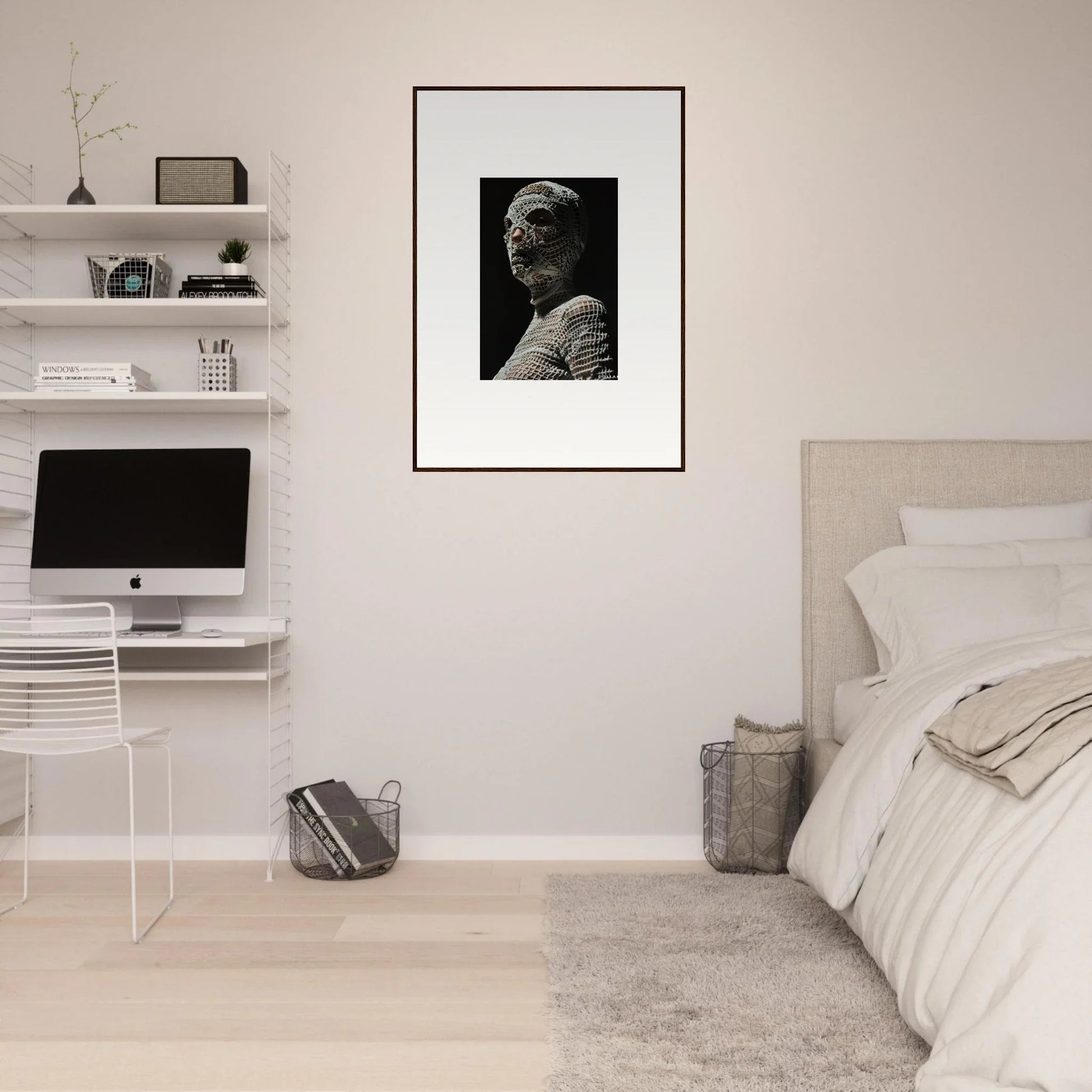 Minimalist bedroom with white walls, floating shelves, and a framed black-and-white portrait.