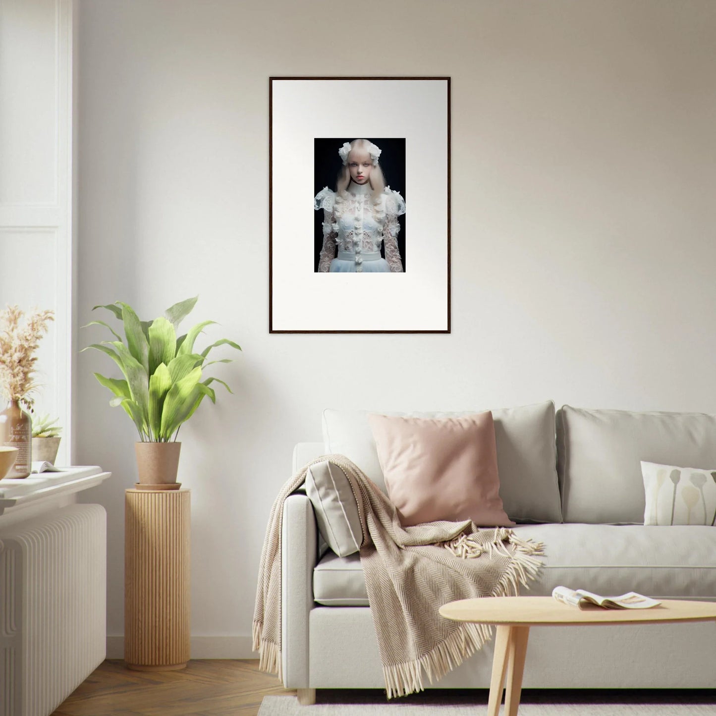 Framed black and white portrait photograph of a person wearing an ornate, textured outfit.