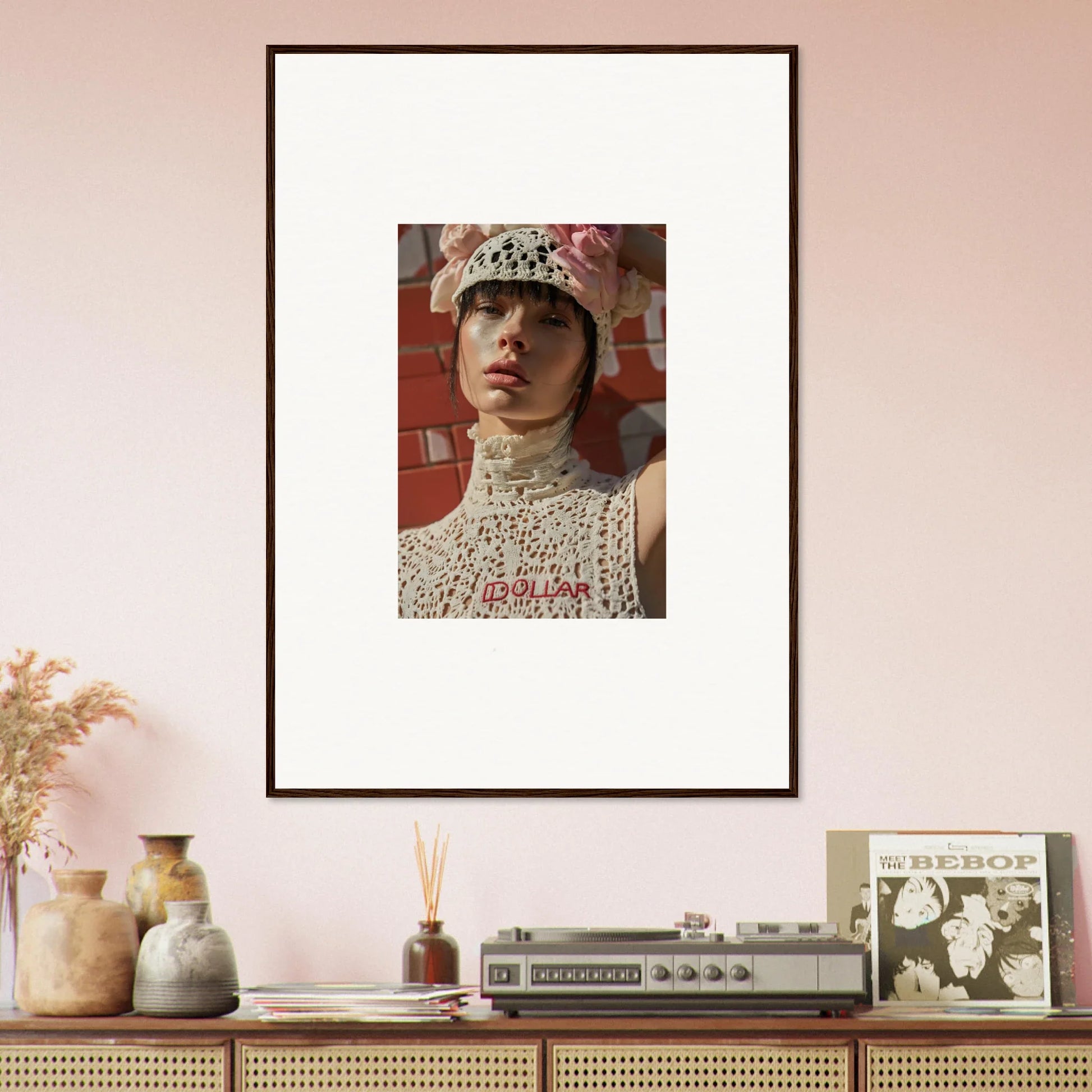 Framed portrait photograph of a person wearing an ornate white lace top and hat.