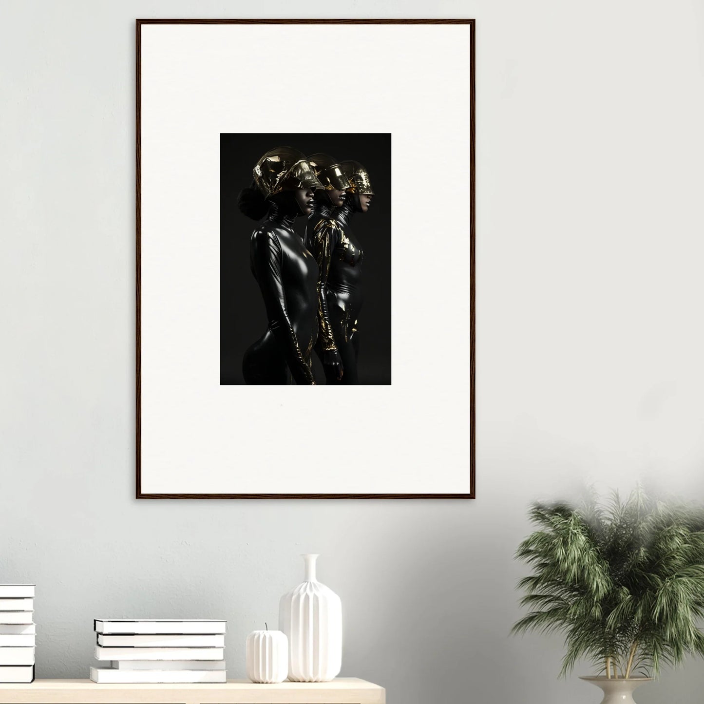 Framed black and white photograph of a figure with metallic or reflective skin.