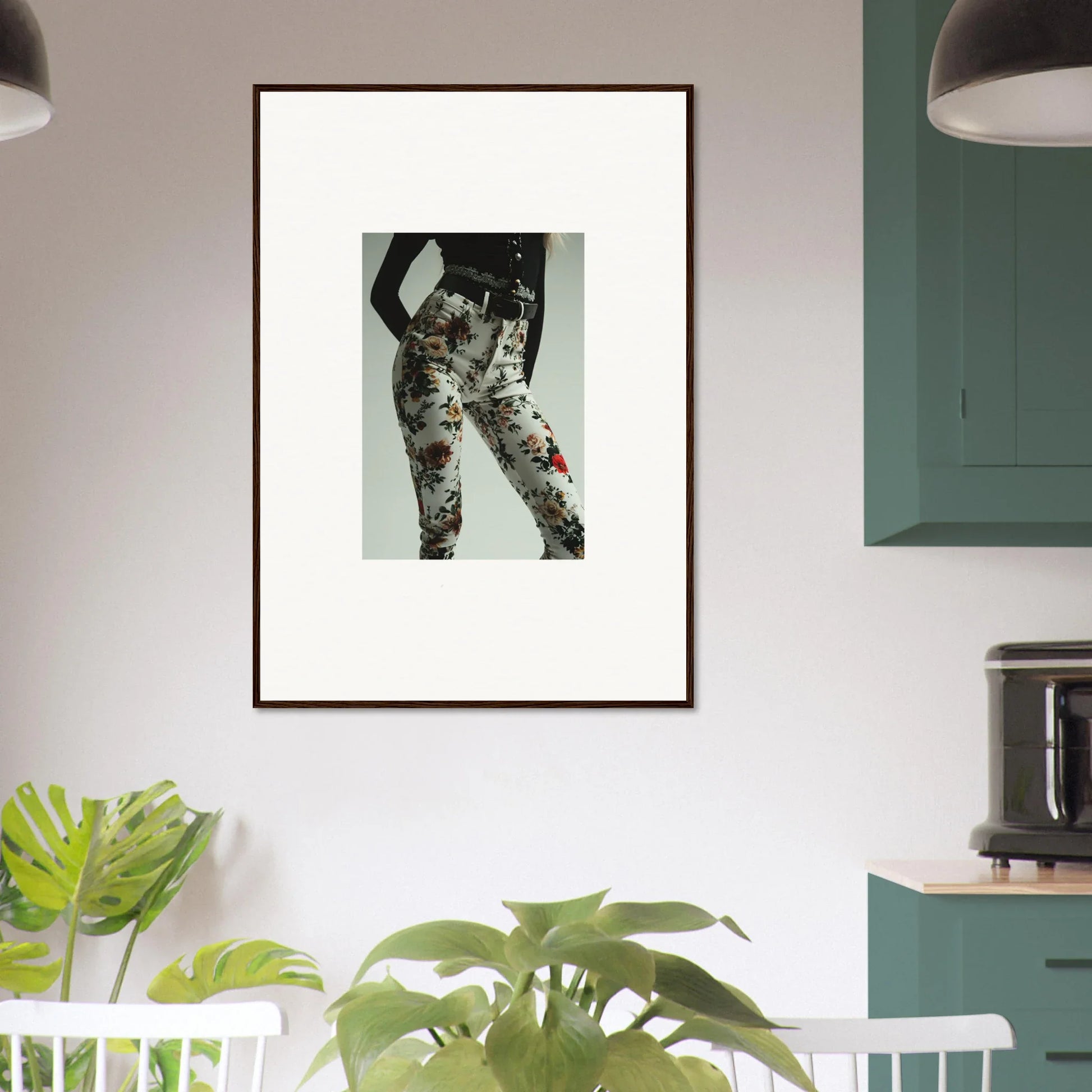 Framed black and white photograph of a person wearing camouflage pants.