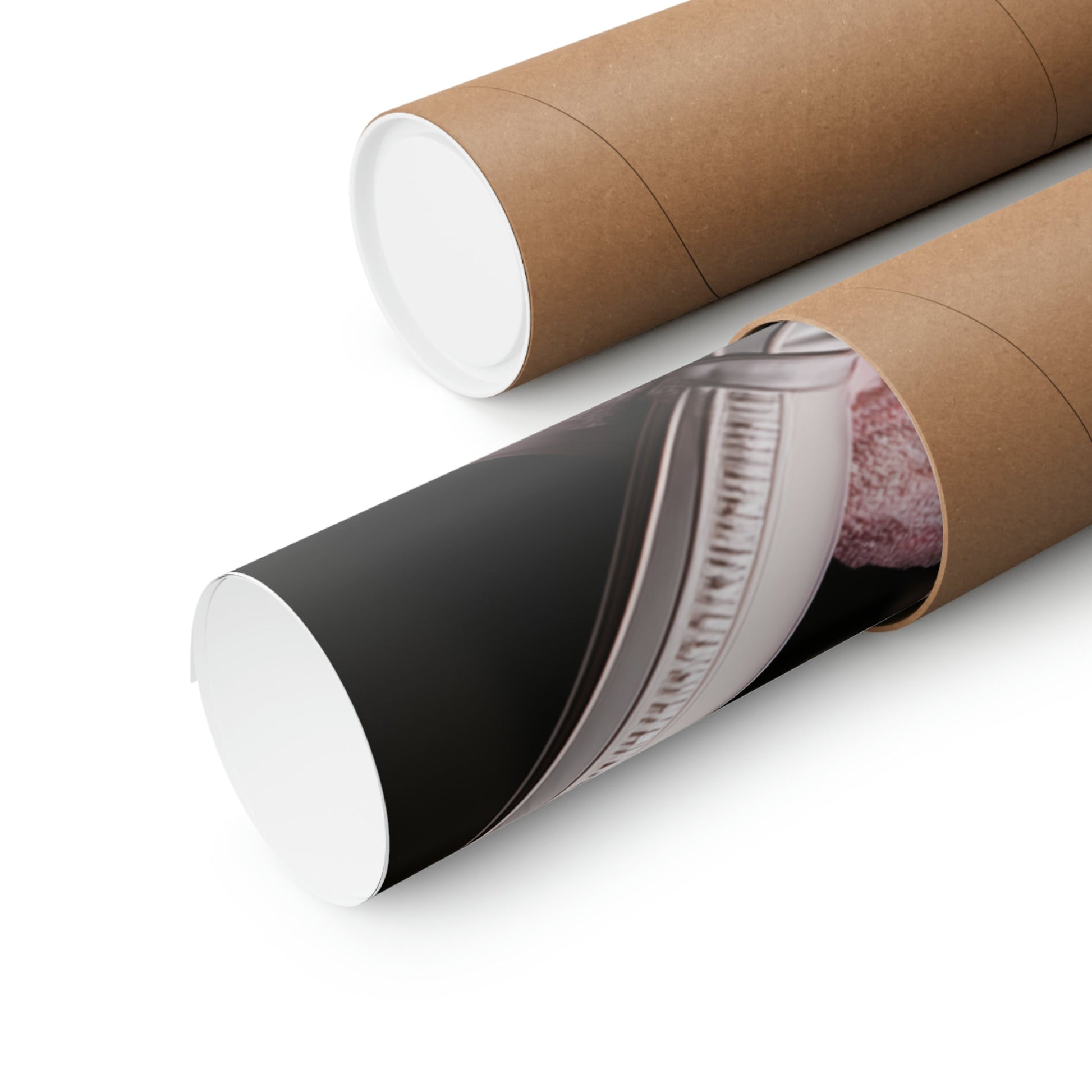 Cardboard mailing tubes with one partially unrolled to reveal contents inside.