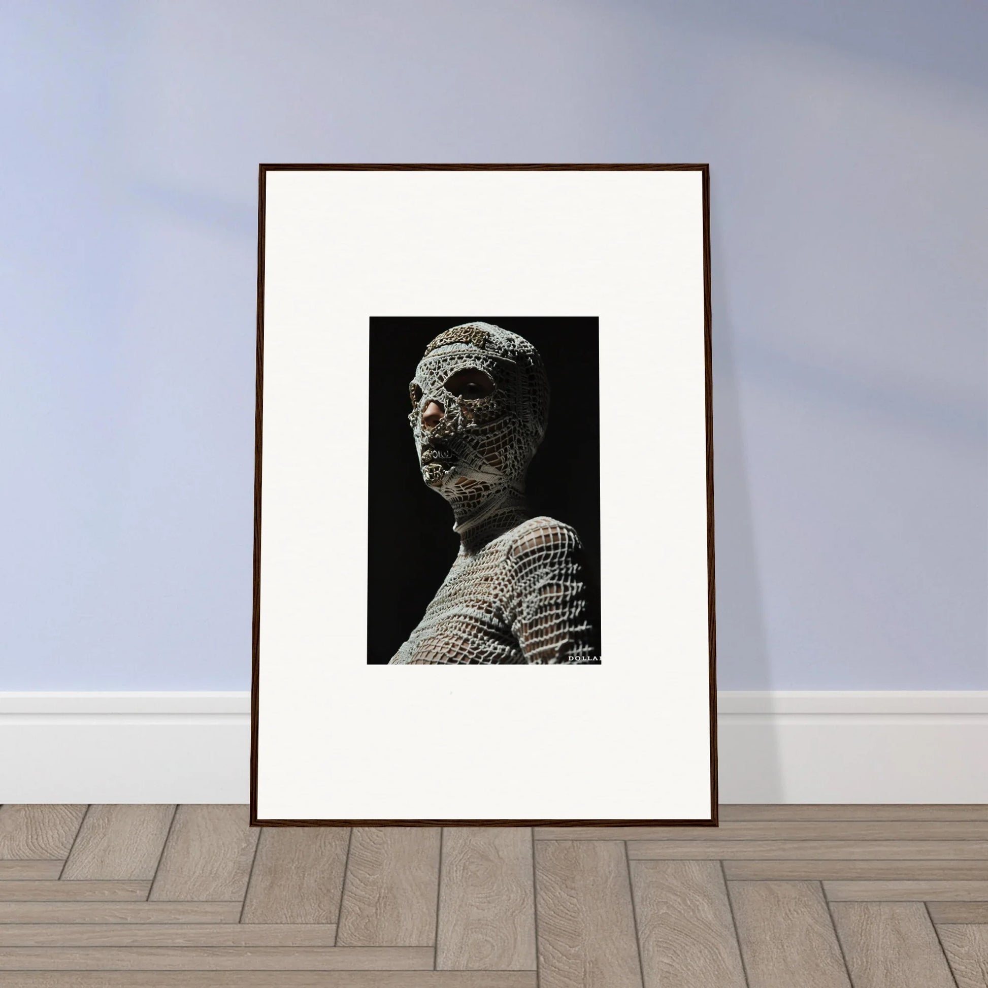 Framed black and white photograph of an ancient sculptural bust.