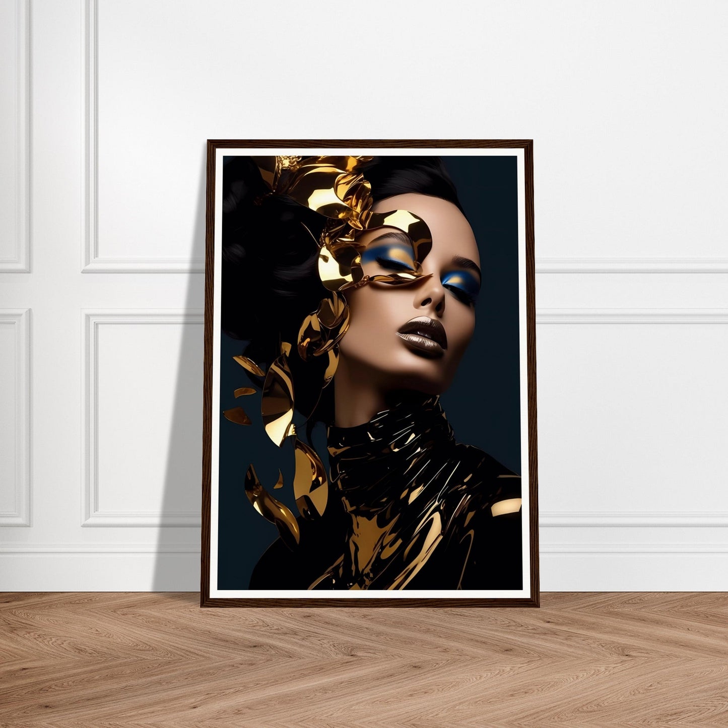 Framed portrait of a person with dramatic gold makeup and accessories against a dark background.