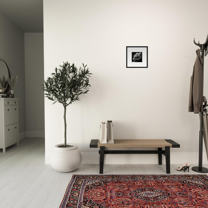 Ornate red and multicolored patterned rug on a white floor.