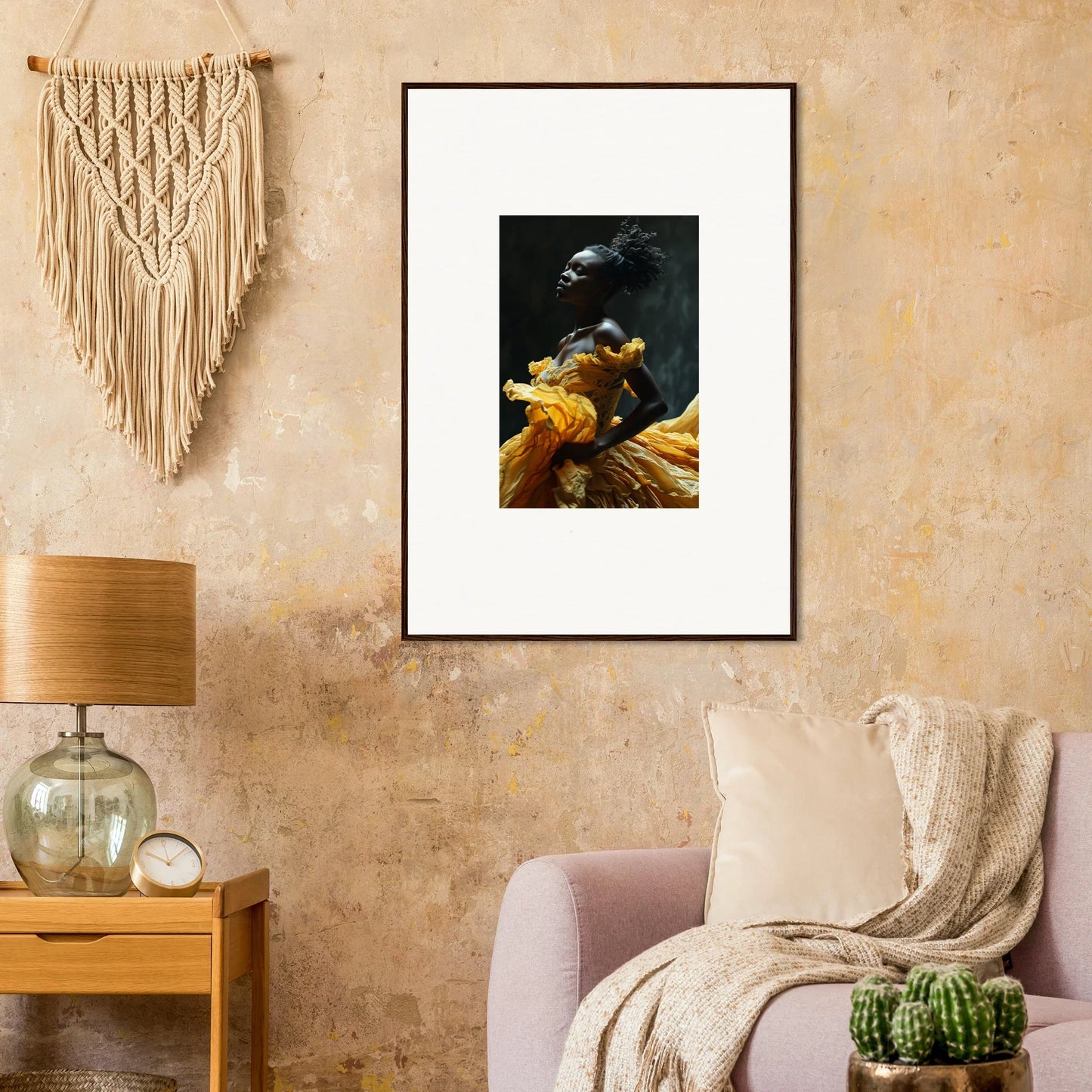 Framed artwork depicting a dark bird with yellow flowers or fabric.