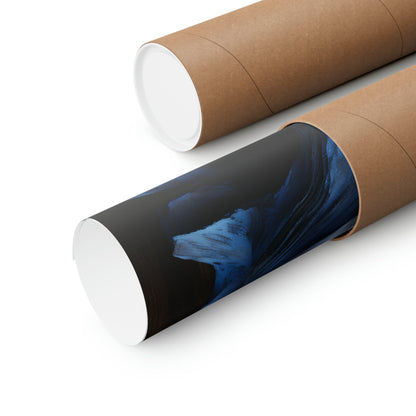 Cardboard mailing tubes, one with a dark blue and black abstract design visible.