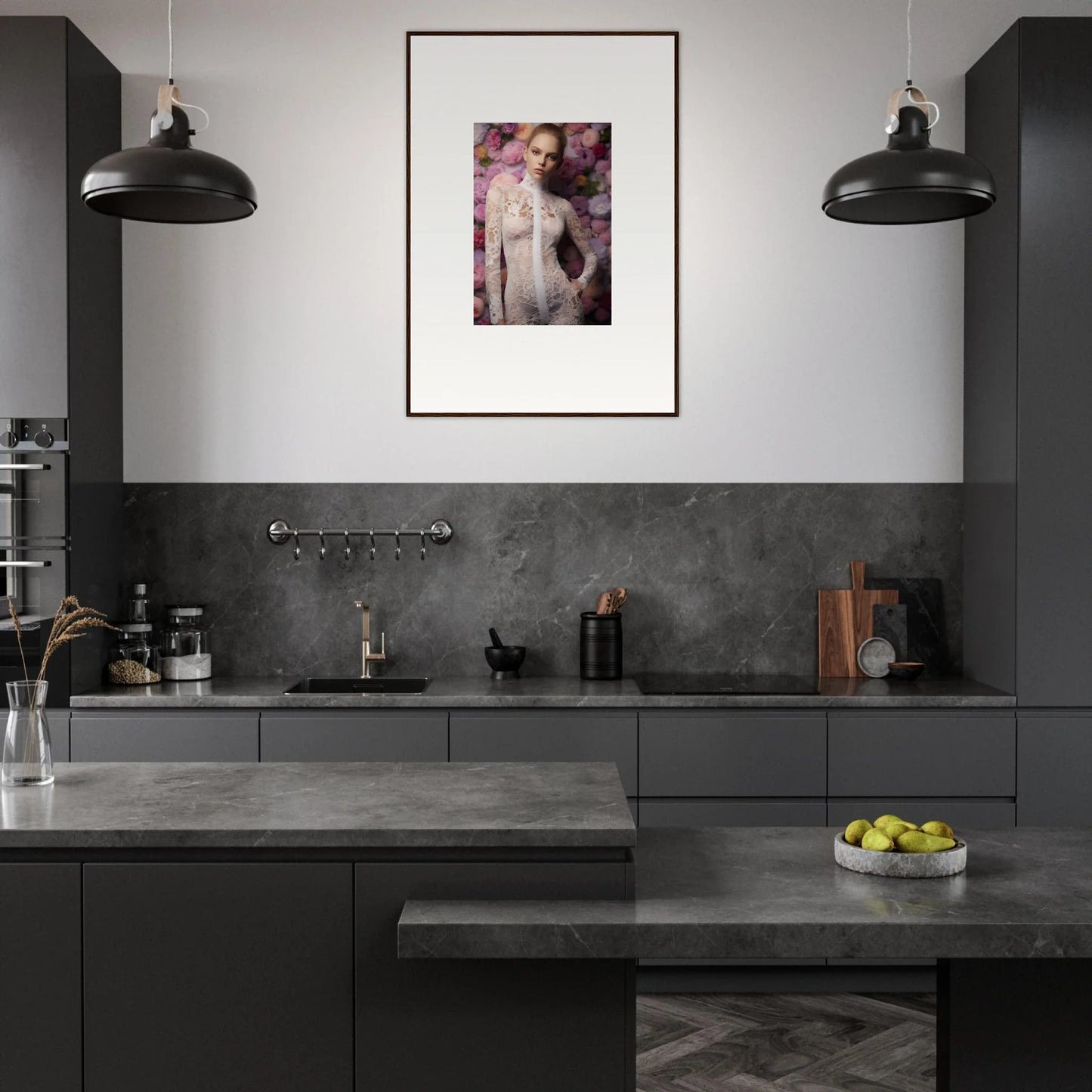 Modern, sleek kitchen with dark cabinetry and countertops.