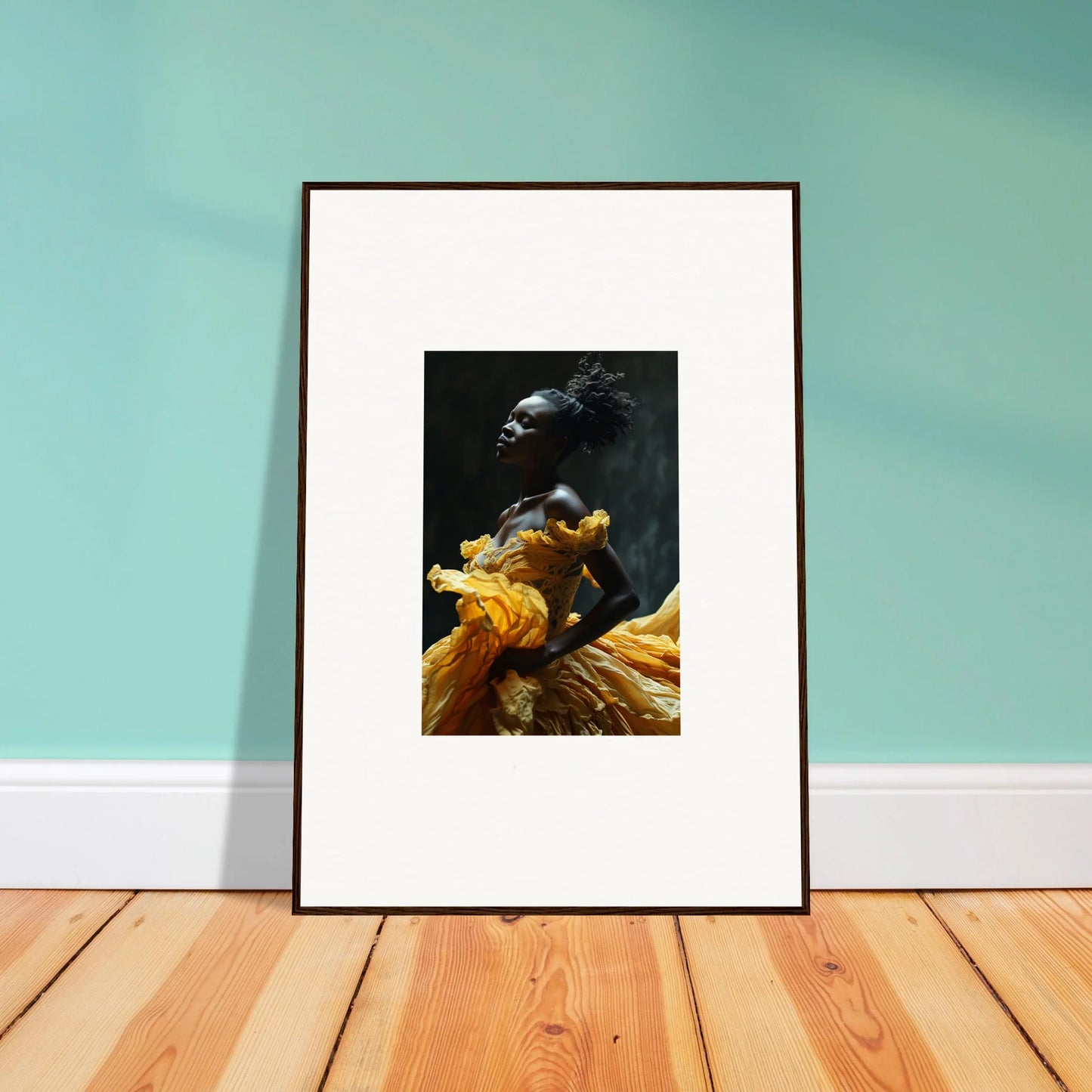 Framed photograph of a person wearing a golden costume against a dark background.