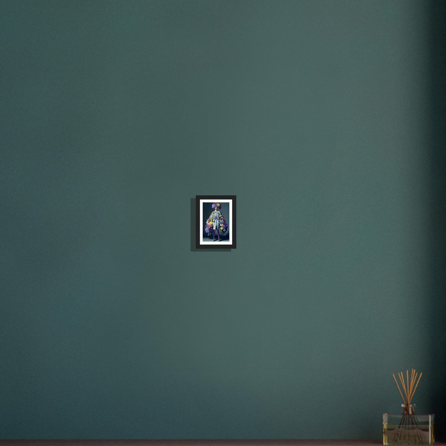 Framed photograph hanging on a dark green wall.