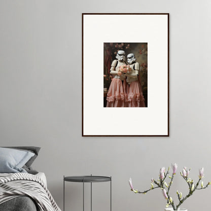 Framed artwork depicting two Stormtroopers from Star Wars wearing pink dresses.