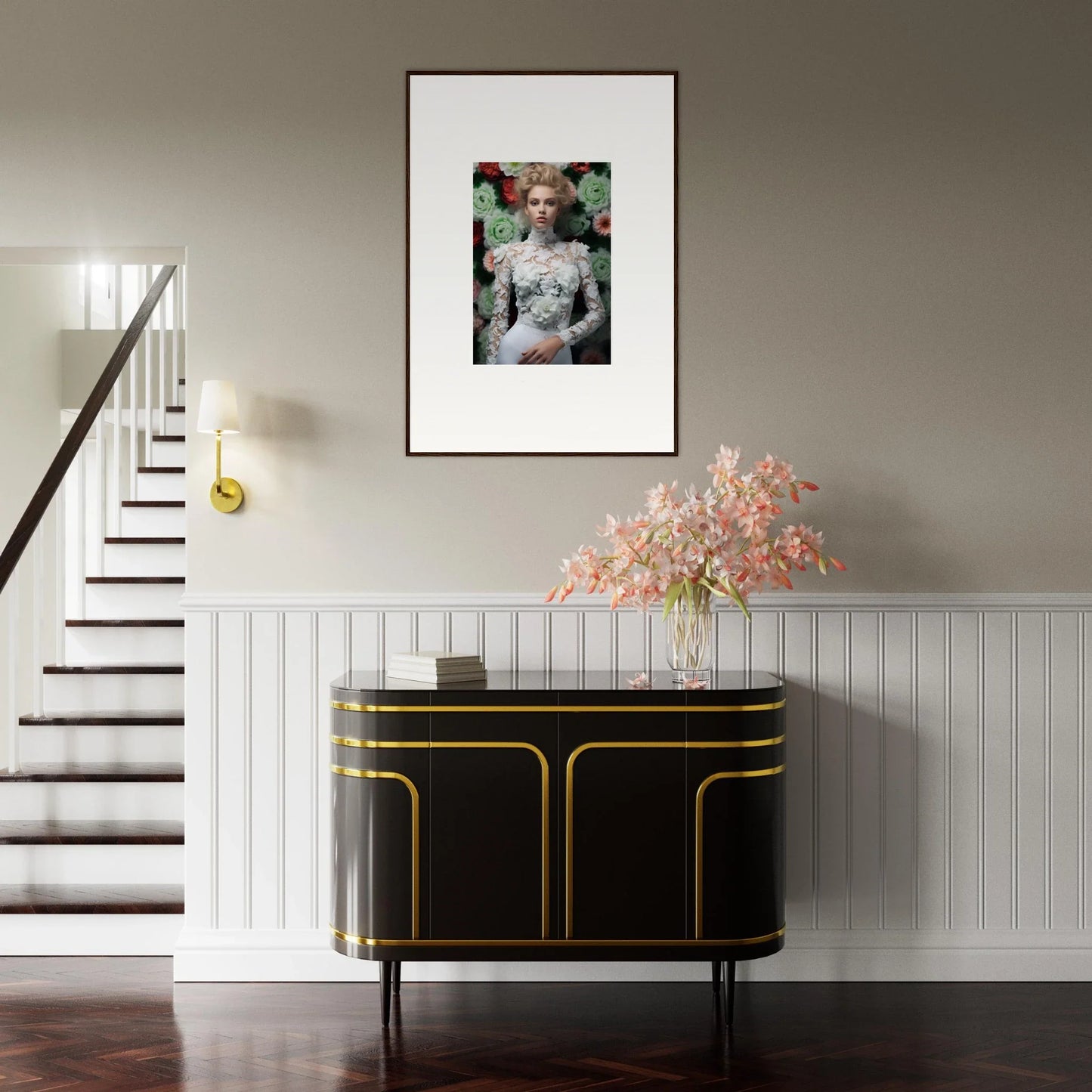 Elegant black and gold sideboard with curved edges beneath a framed artwork.