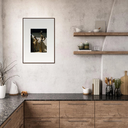 Modern kitchen with wooden cabinetry, open shelving, and framed artwork on the wall.