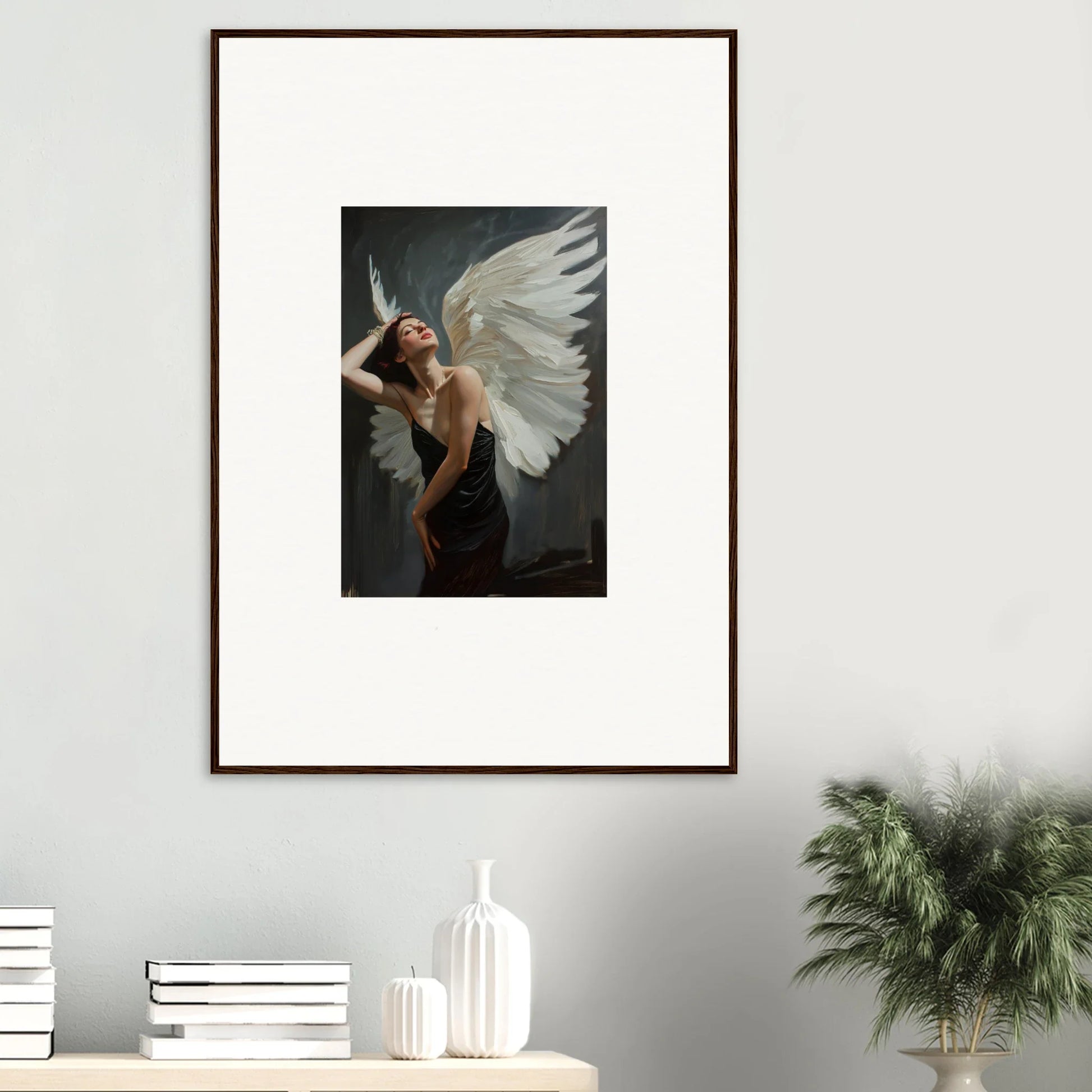 Framed canvas print of a figure with white wings, perfect for femme ascent room decoration