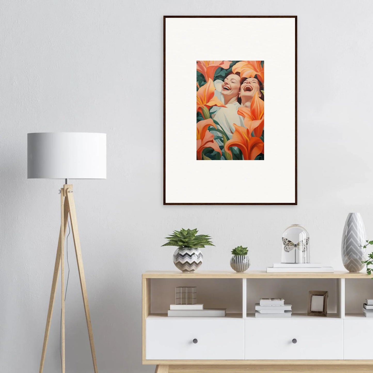 Framed wall art featuring two figures with vibrant orange flowers for room decoration