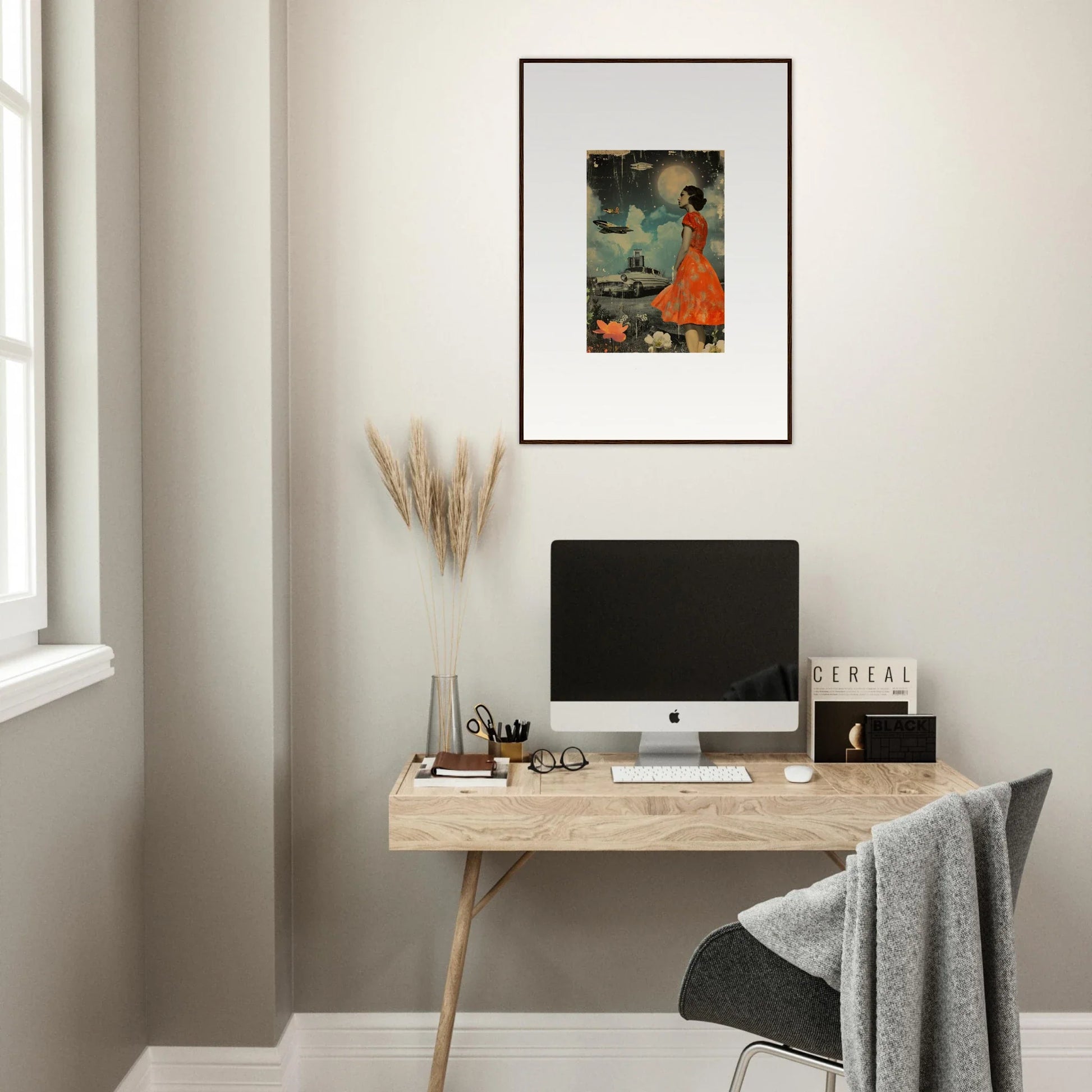 Minimalist home office with a wooden desk, computer, and Veil Tales canvas print