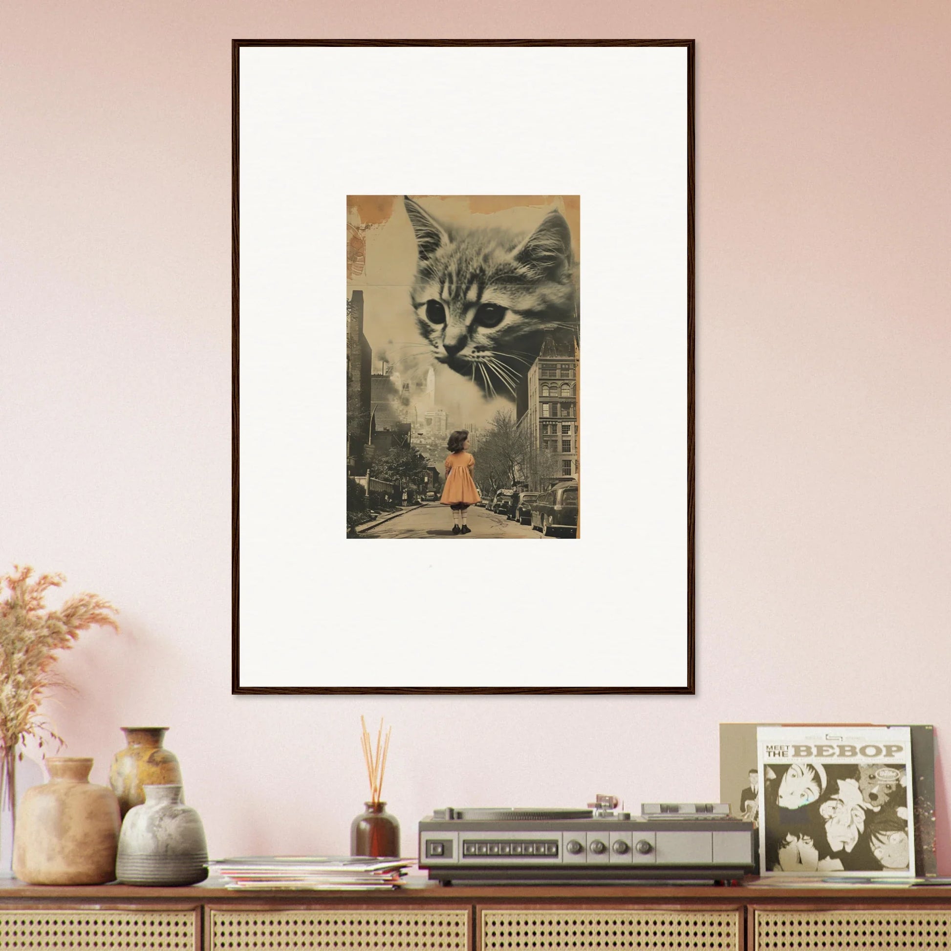 Framed canvas print of a giant cat’s face above a city street for unique room decoration