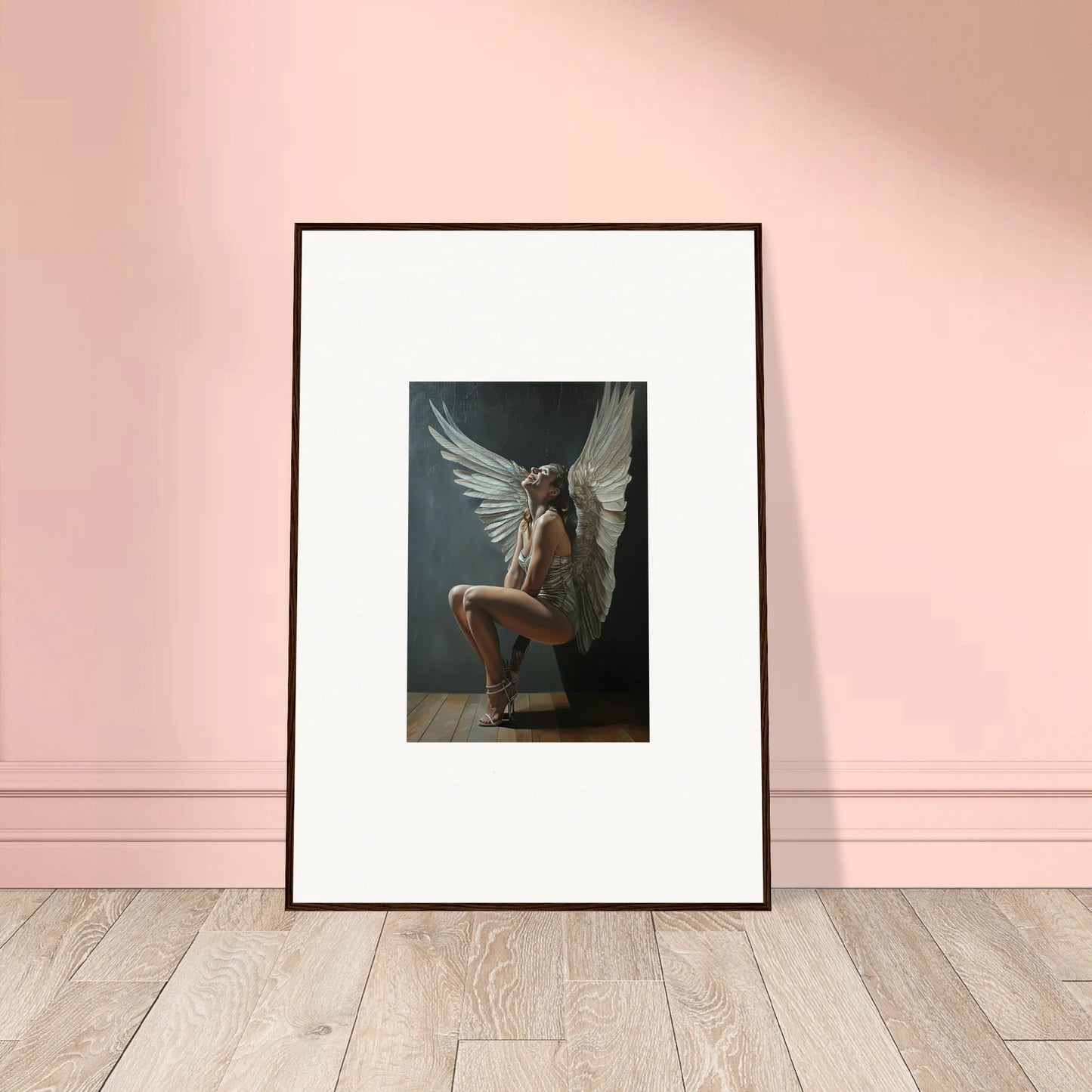 Framed photo of a figure with large wings in a crouch for Heavenly Weakened Psalms