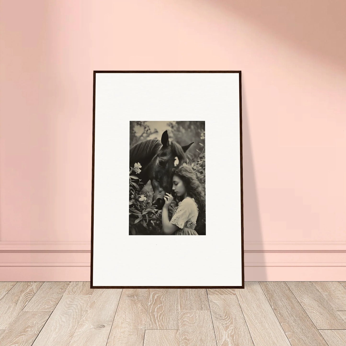 Framed black and white photo of a person with a gorilla, perfect for equinox whispers room decoration