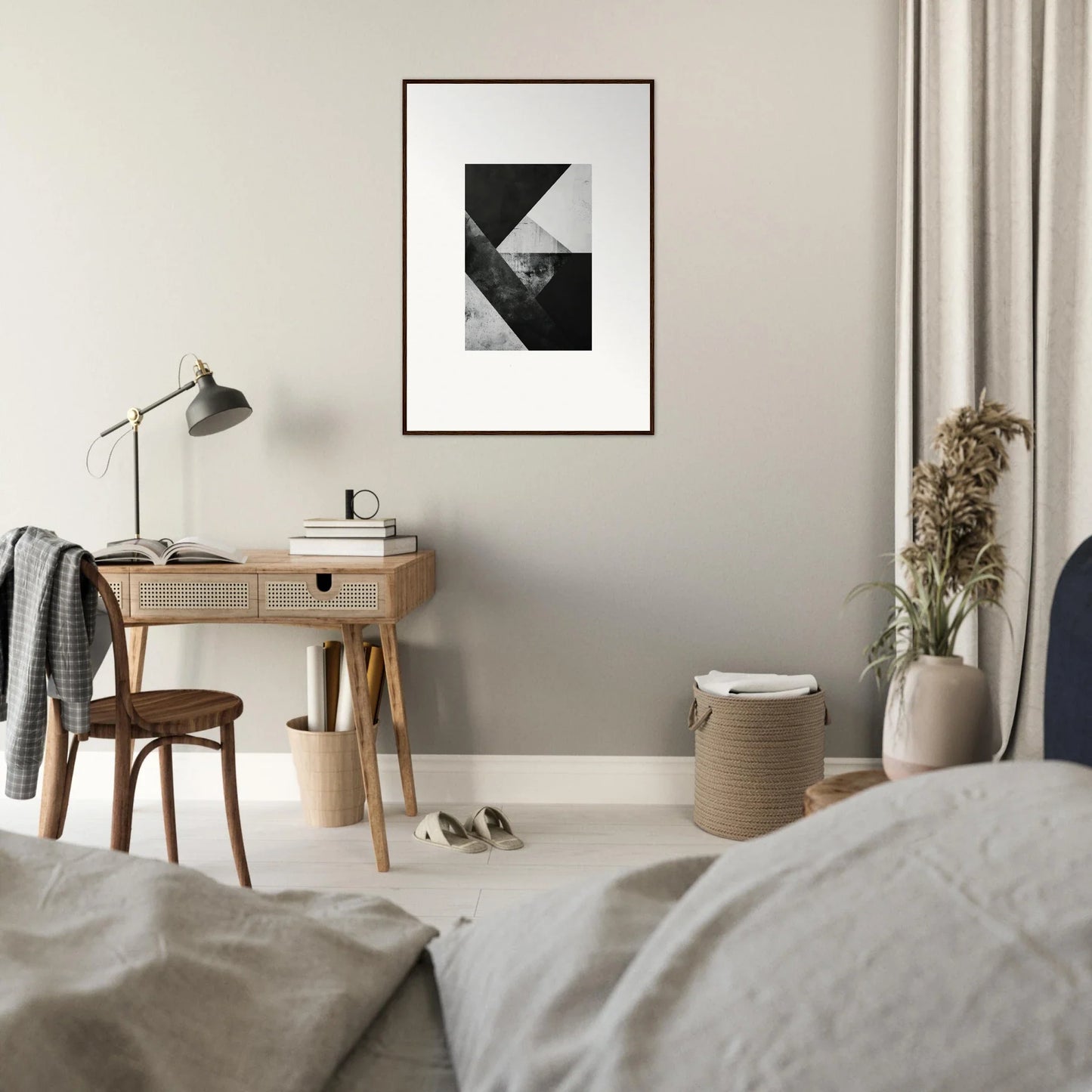 Minimalist bedroom with wooden desk, chair, and Geometric Mindscapes canvas wall art