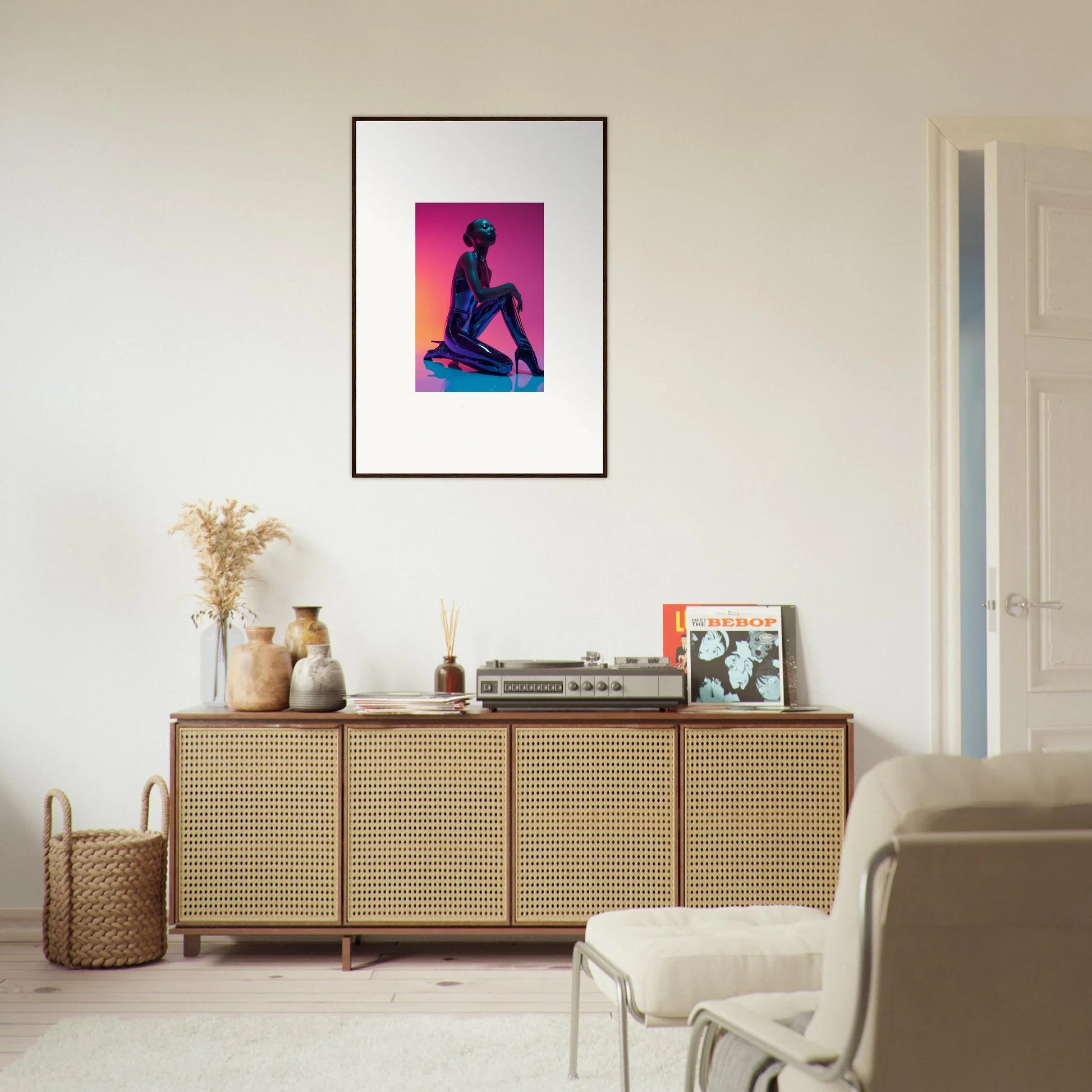 Framed neon vortex canvas print of a silhouetted figure with vibrant pink and orange background