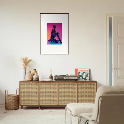 Framed neon vortex canvas print of a silhouetted figure with vibrant pink and orange background