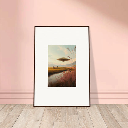 Framed wall art of a UFO over a sunset meadow, perfect for unique room decor