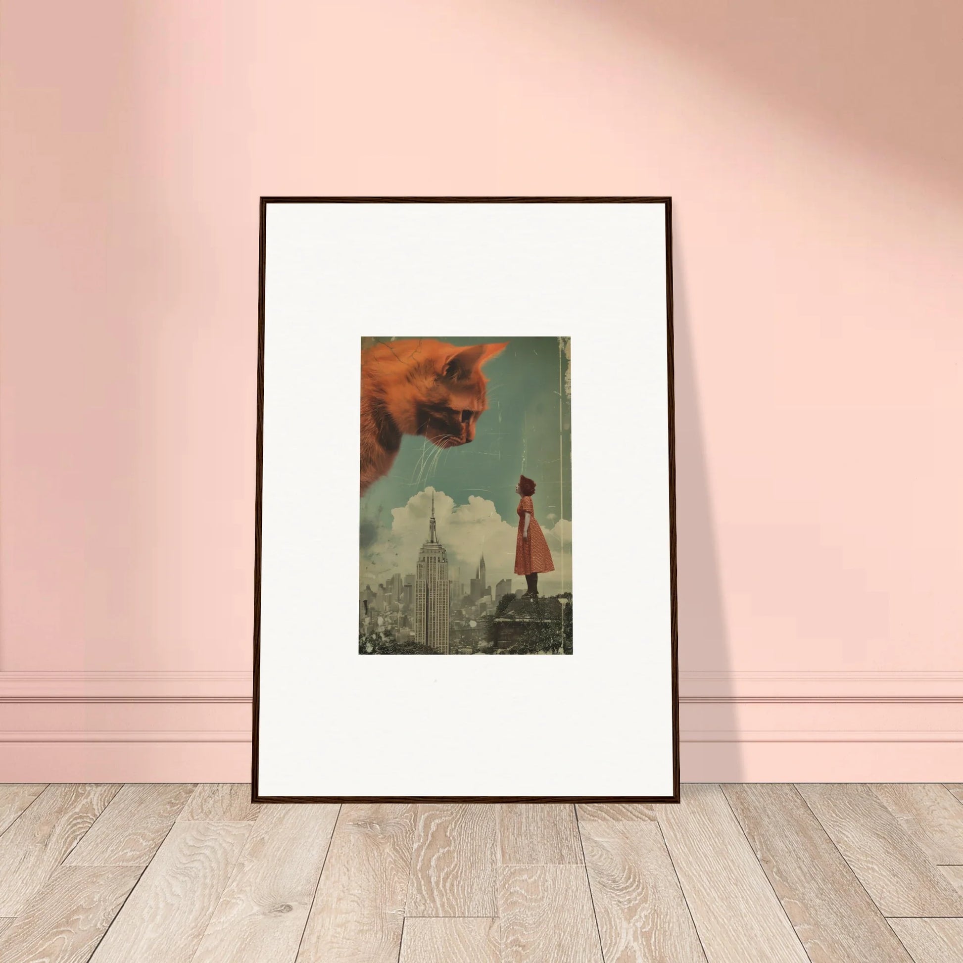 Framed wall art of a woman and giant cat head, perfect for unique room decor