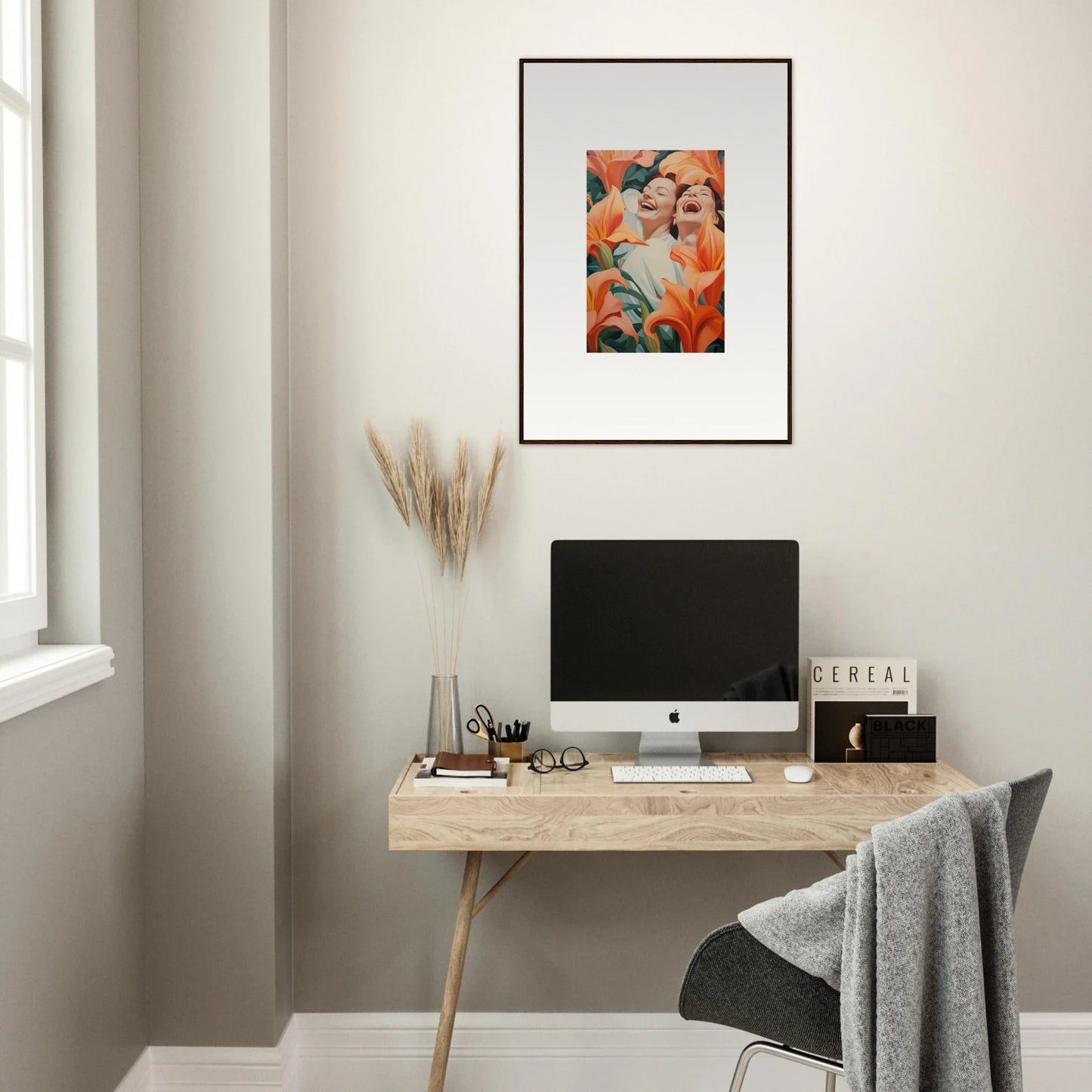 Minimalist home office with wooden desk, computer, and stylish wall art for room decoration