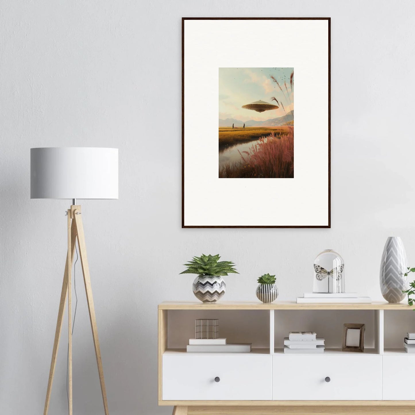 Framed wall art of a sunset landscape and UFO for unique room decor featuring Meadow Raindancers