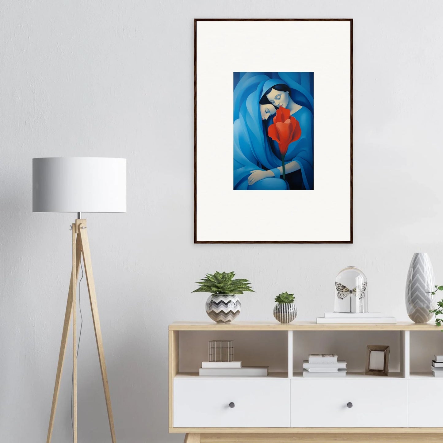 Framed canvas print of a stylized figure in blue and red for vibrant room decoration