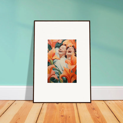 Framed wall art of two laughing figures with orange lilies for vibrant room decoration