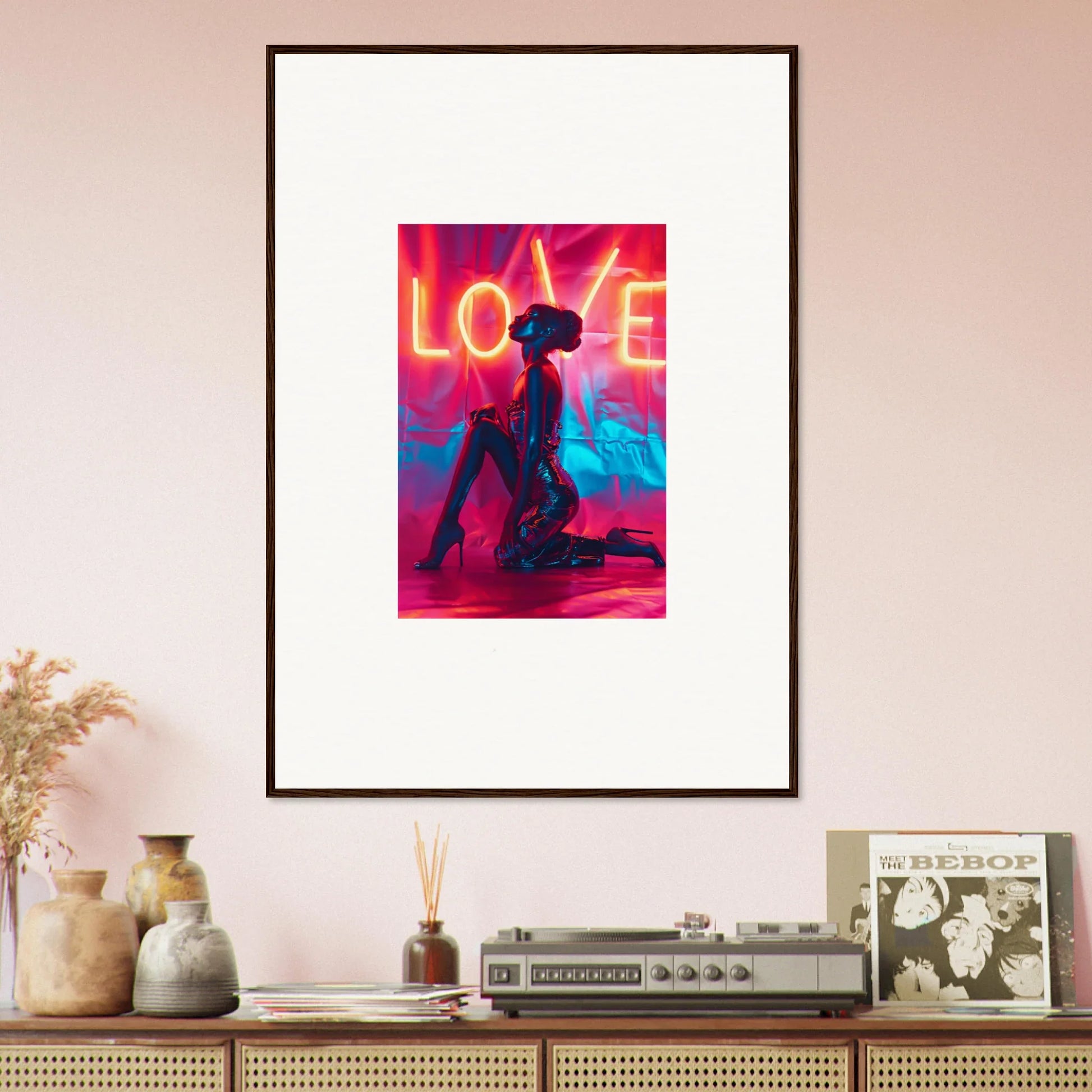 Framed canvas print of silhouetted figure with neon LOVE text for trendy room decoration