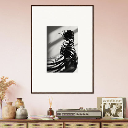 Framed black and white photo of a silhouetted figure, perfect for room decoration with Whisper Twists