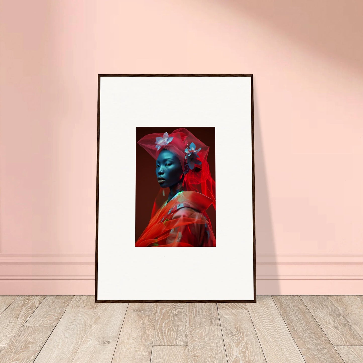 Framed canvas print of a blue-skinned figure in red for unique room decoration