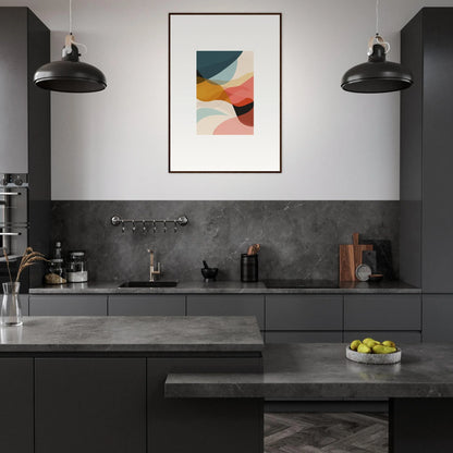 Modern kitchen showcasing dark cabinetry and a vibrant canvas print for room decoration