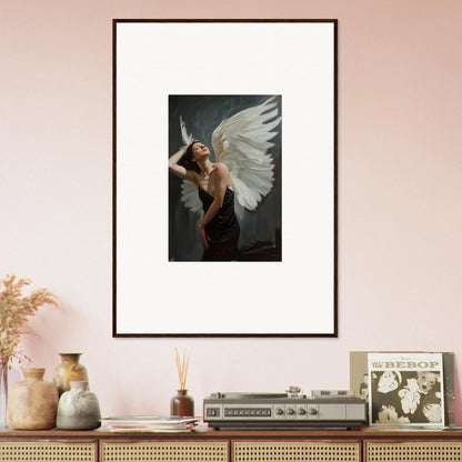 Framed canvas print of a figure with white wings, perfect for femme ascent room decoration